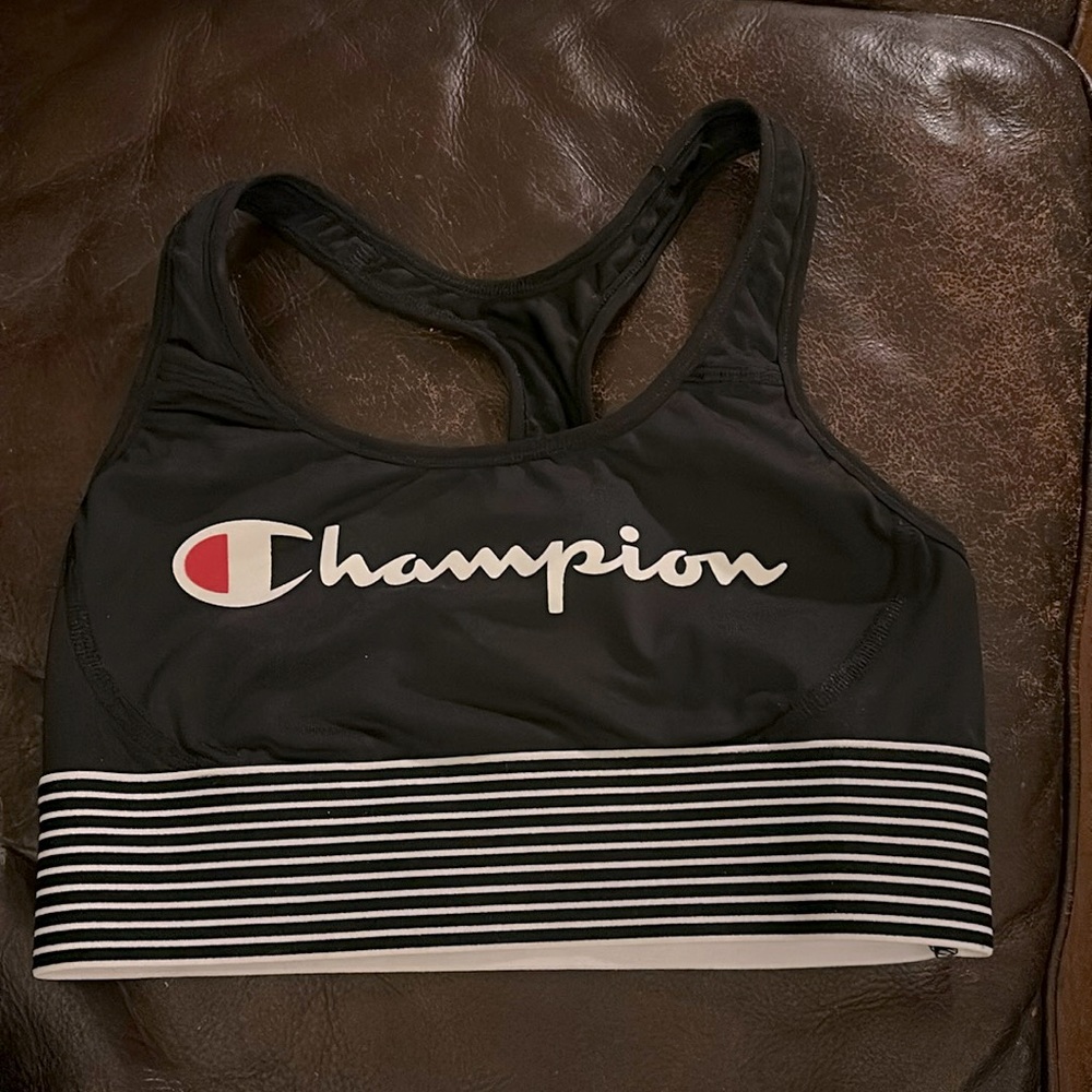 Champion sports bra. Size small. Black with black and white striped band.